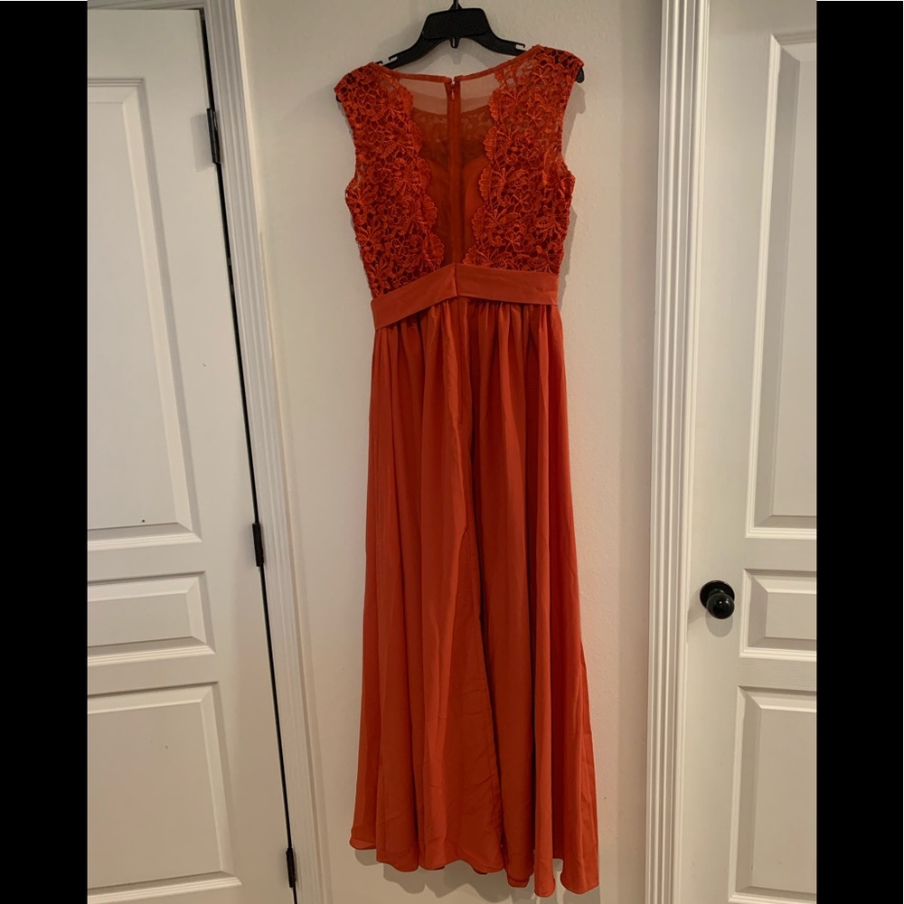 Rust colored bridesmaid dress.